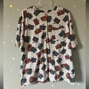 Vintage women’s top with luggage pattern